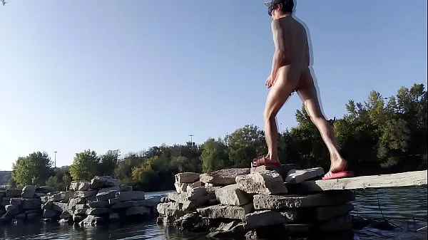 Fresh Gay twink does naked yoga outside on a rocky beach, gay cruising men passing by might watch him new Clips